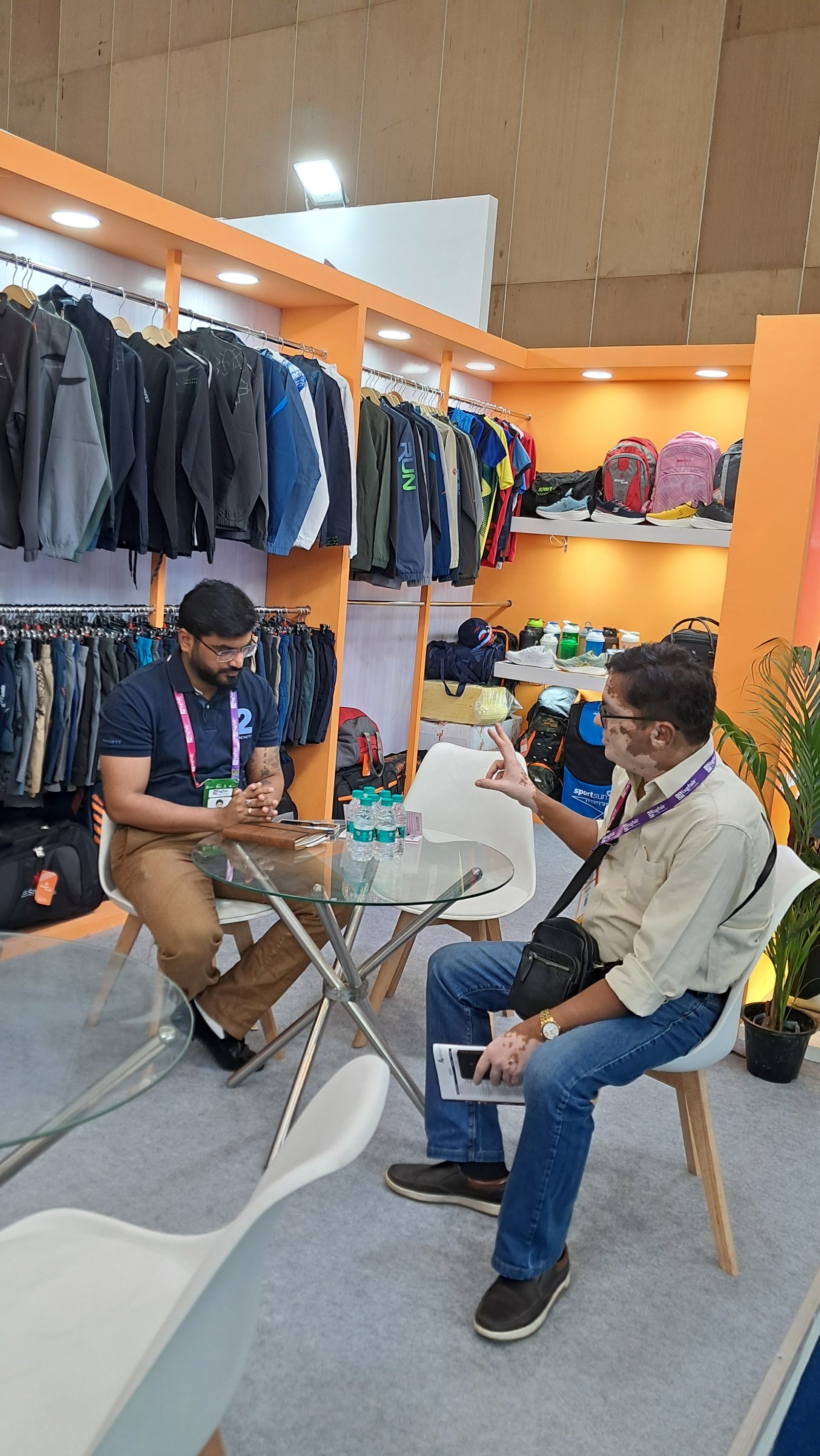 SPA members in a business meeting at a sourcing fair stall